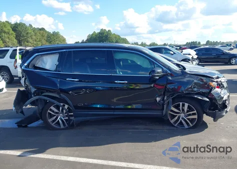 2017 Honda Pilot Touring z USA, uszkodzony, nr VIN 5FNYF5H91HB005559